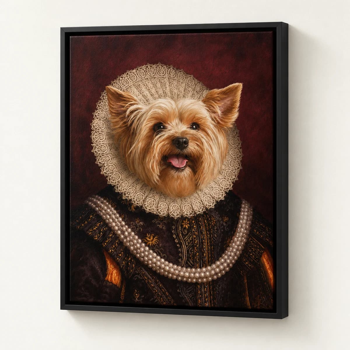 Queen custom pet portrait in a black floating canvas frame on an ivory wall
